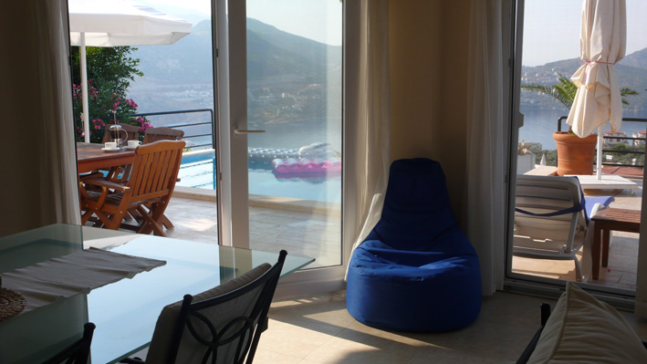 Beanbags in lounge in front of doors to pool terrace and wonderful views of Kalkan bay