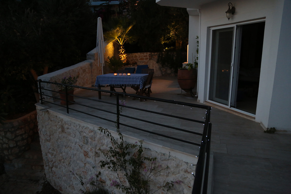 Private terrace and table for al fresco dining, by candlelight
